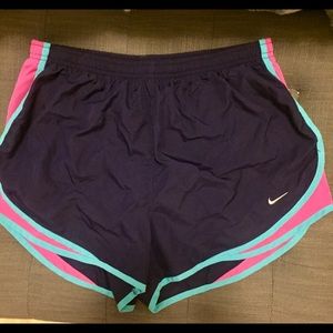Nike shorts with dark purple hot pink and green!